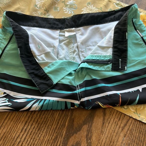 Men's Swim Shorts Mirage Aggrolite Floral Trunks Green Floral.  4 way Stretch - Picture 7 of 10